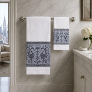 Grifo ecru linen towel with a refined black woven decorative band and hemstitch finish.