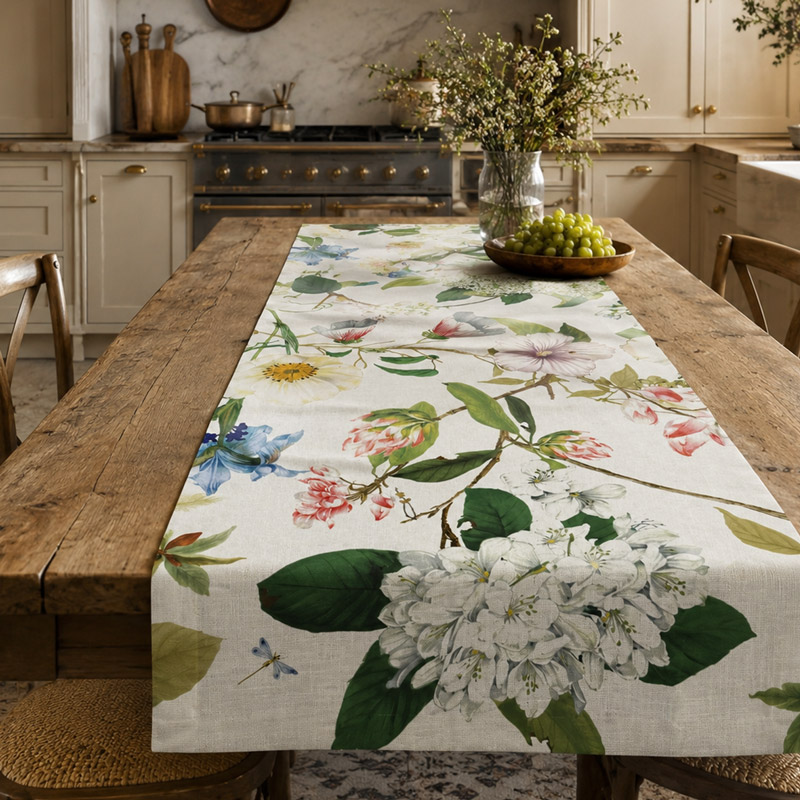 luxury-linen-table-runner-Ibisco-La-Bottega-di-Casa Ibisco printed Italian linen table runner with hibiscus and hydrangea design on a rustic wood table, La Bottega di Casa