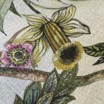 Close-up of the multicolor botanical print on the Biloba pure linen tablecloth