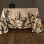 tablecloth with design with festive elements such as wrapped gift boxes with green and beige ribbons, pine branches, pinecones, and delicate ornaments
