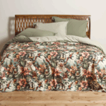 bedspread with a lively, tropical design featuring exotic flower patterns and playful monkeys