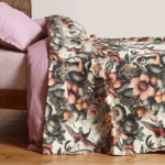 bedspread with a lively, tropical design featuring exotic flower patterns and playful monkeys