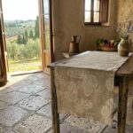 Fauna Crema linen runner in a Tuscan country house
